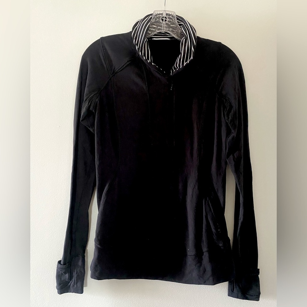 Lululemon black long sleeve 3/4 zip running pullover. Like new condition.